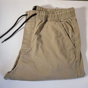 Beige Denizen Joggers. Large